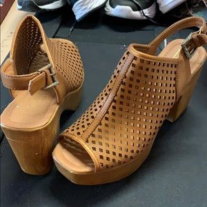 Brown wedge clogs